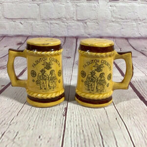 Vintage Pennsylvania Dutch Country Ceramic Stein Salt and Pepper Shaker Pair